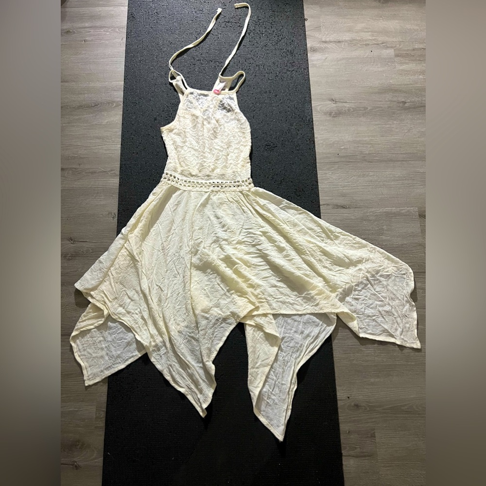 Off white color asymmetrical dress.
